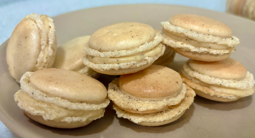 Vanilla latte macarons on a plate