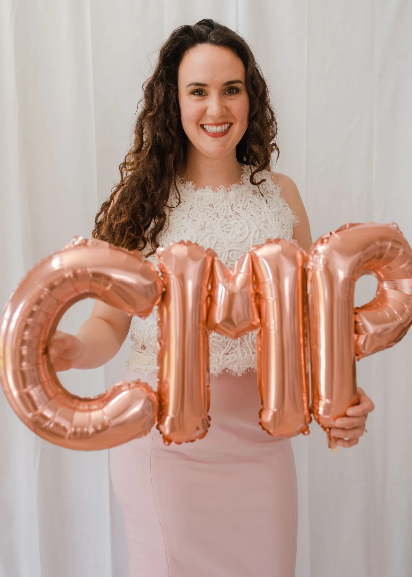 a woman holding a balloon