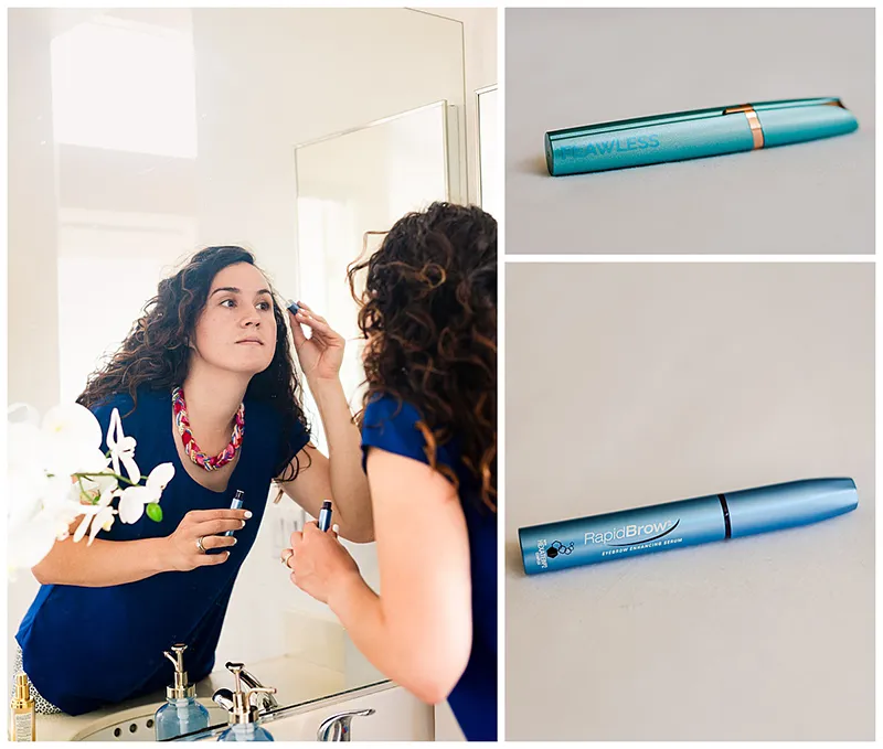 a woman putting on mascara