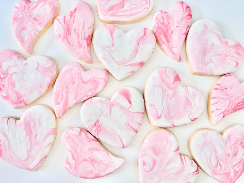 Pink and white marbled heart-shaped sugar cookies