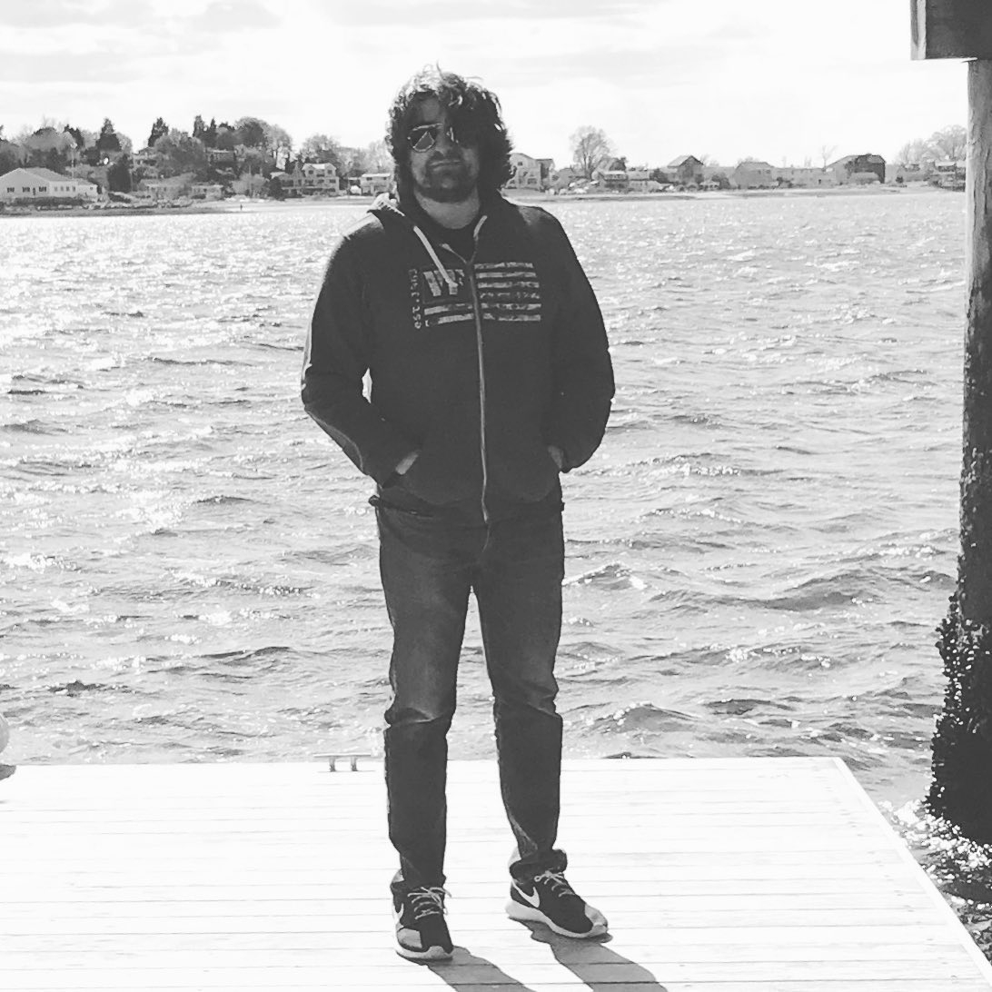 Jim standing on a dock.