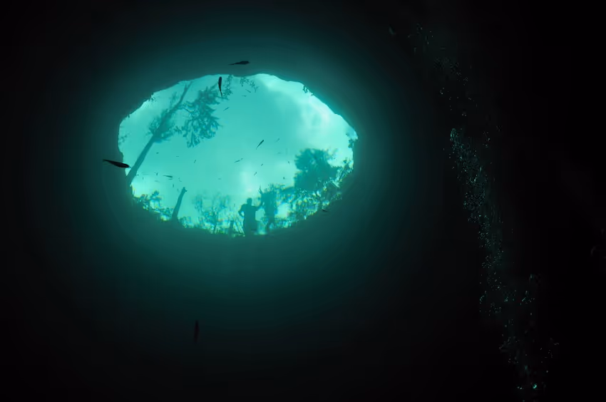 Entrance to clear waters at cenote Calavera, one of the top cenotes in Tulum