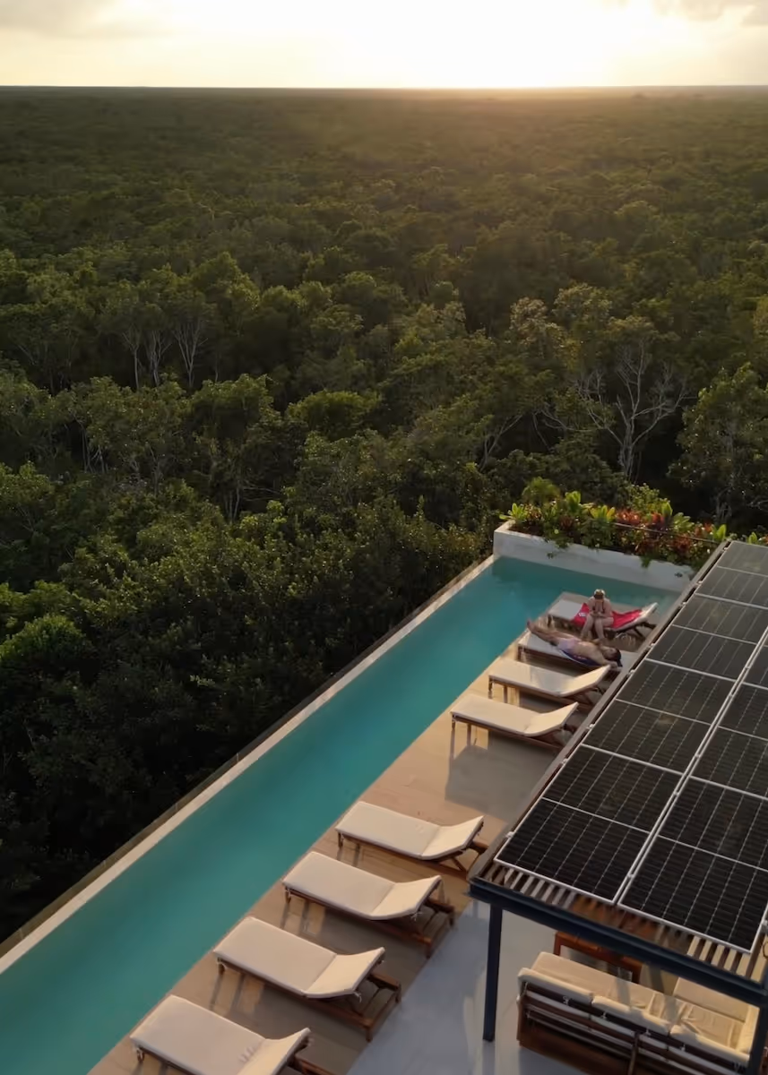 Modern residential development with solar panels in Tulum – smart way to invest in Tulum real estate