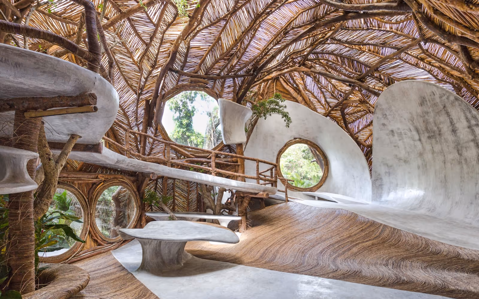 Variety of architectural styles from brutalism to organic forms in modern residences in Tulum