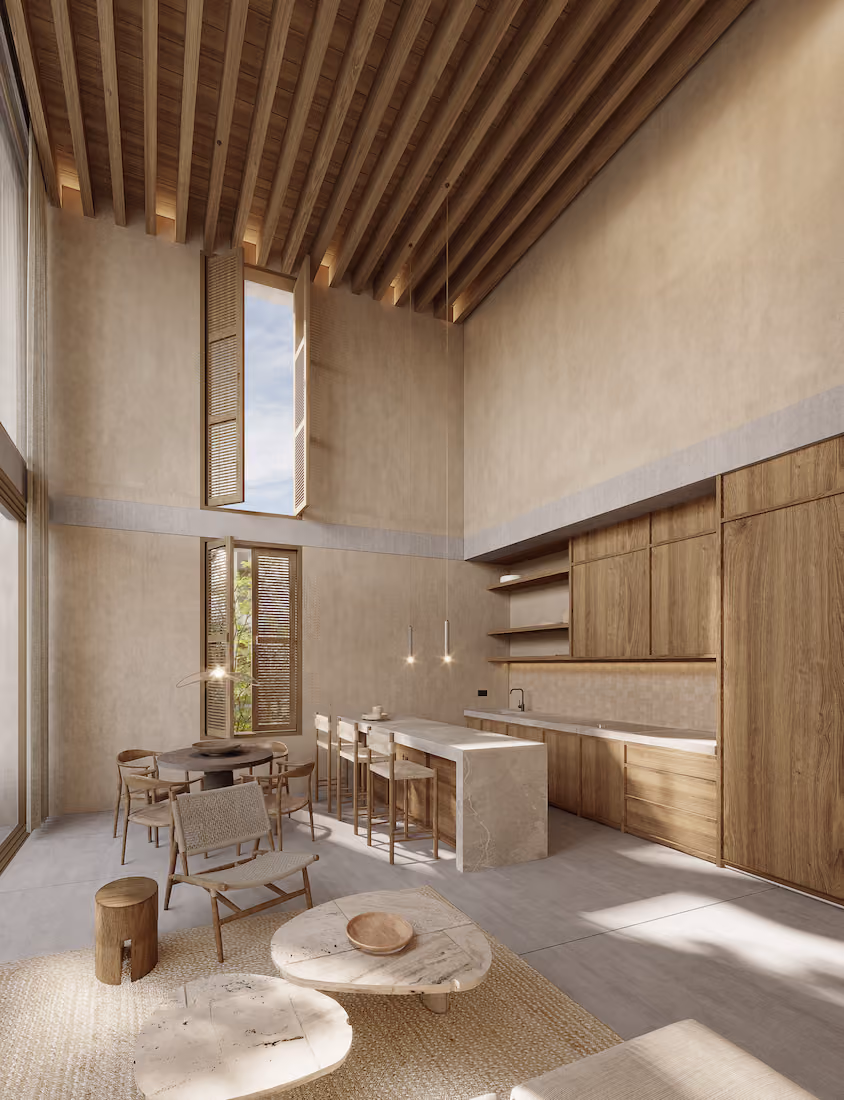 Double-height condo interior with wood ceiling beams and natural light at Mayab Tulum in Tulum, Mexico.