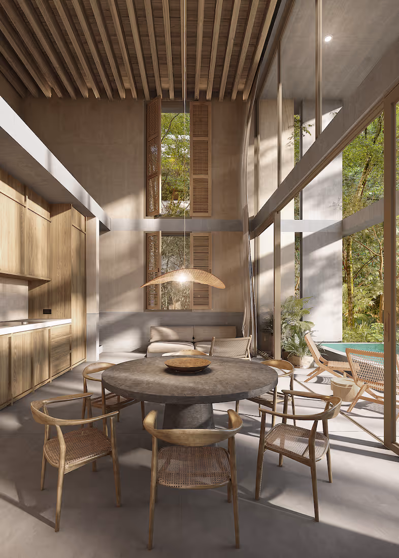 Double-height living and dining area with 20-foot ceilings and jungle views at Mayab Tulum.