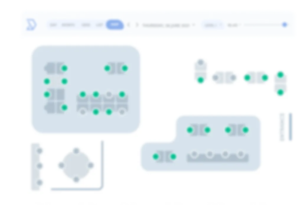 Blurry interface showing office layout with tables and green status indicators.