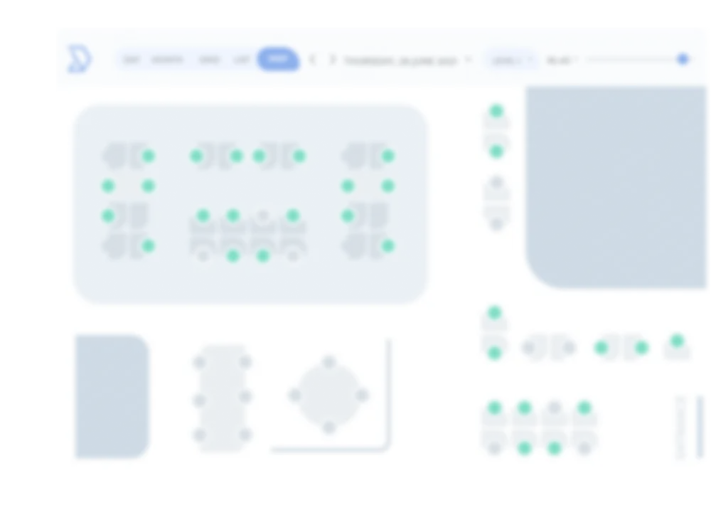 Blurry digital seating chart with green dots marking selected or occupied seats.