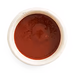 GYG hot sauce side in a dish