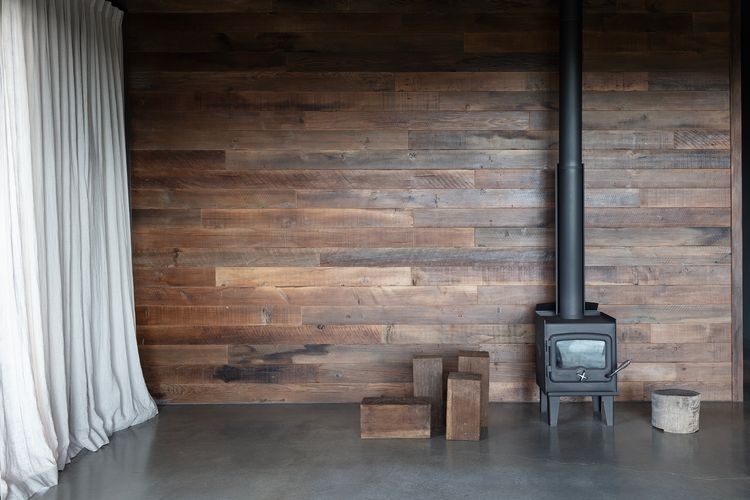 Organic materials and artisanal rustic joinery, creating a warm, grounded aesthetic