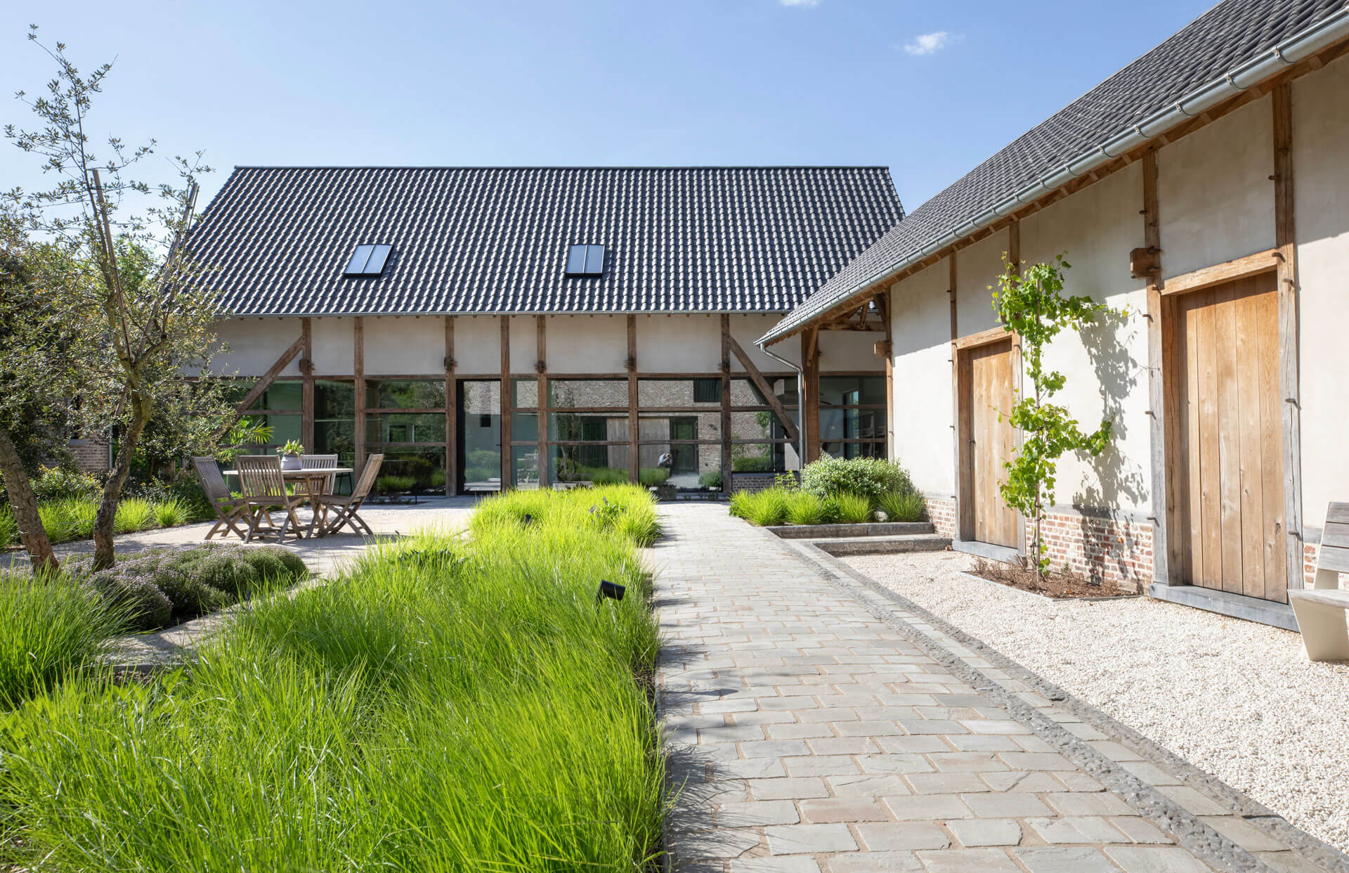 BOND. Architectuur - Huisvesting en Commercieel - Herk-de-Stad - ééngezinswoning en B&B