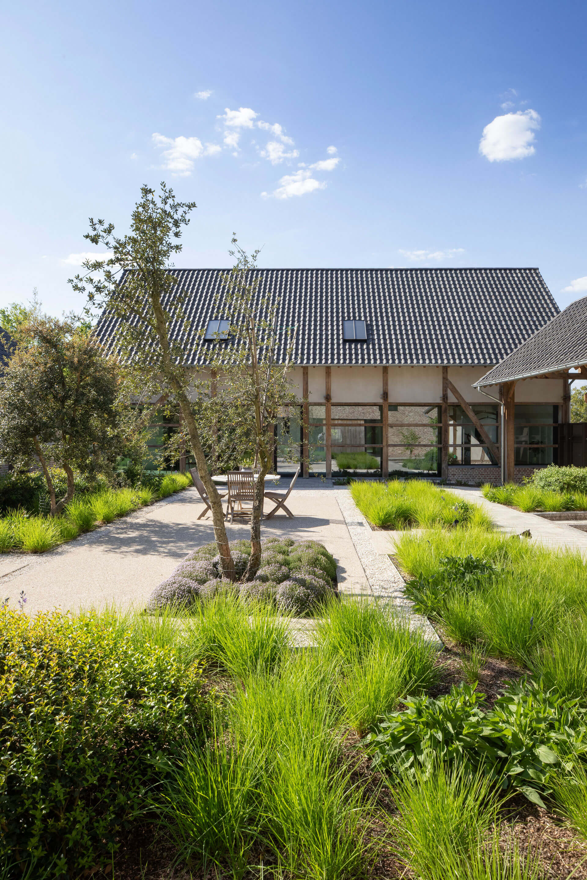BOND. Architectuur - Huisvesting en Commercieel - Herk-de-Stad - ééngezinswoning en B&B