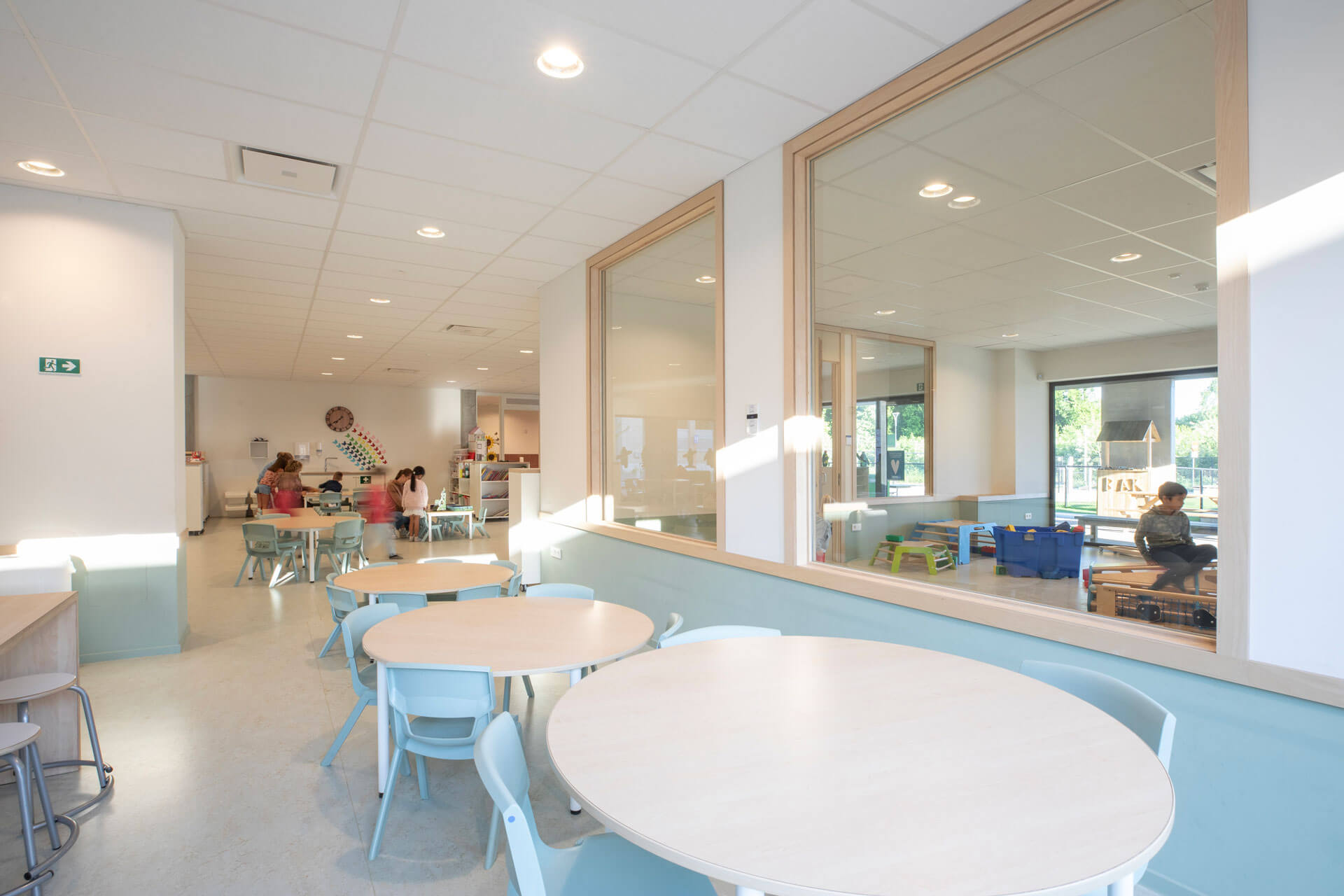 BOND. Architectuur - Huisvesting en Publiek - Koersel - buitenschoolse kinderopvang en 14 sociale woningen