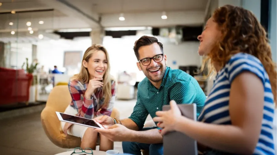 A group of people sitting around a tableAI-generated content may be incorrect.