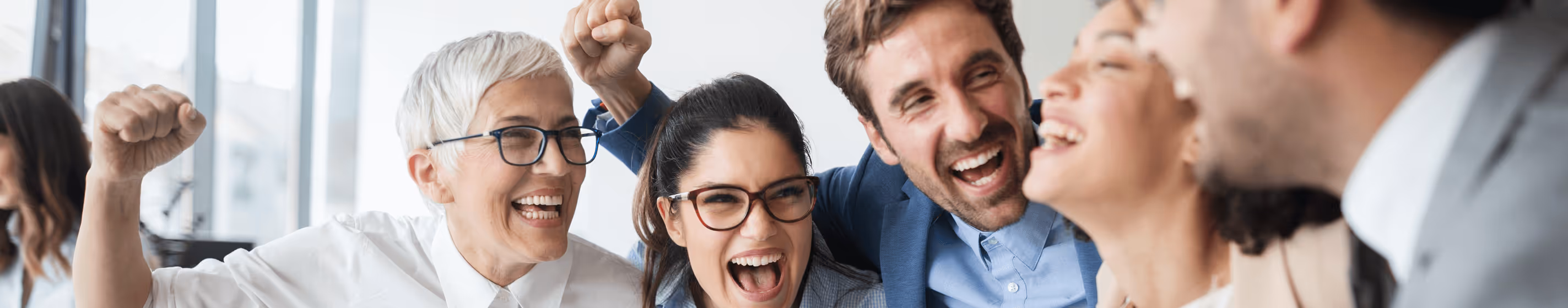 Engaged employees celebrating list achievement