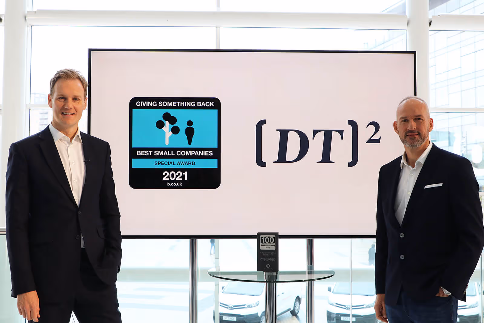 TV Presenter Dan Walker with Toby Pearson CEO Of DTSquared and their Giving Something Back Special Award at Best Companies Live