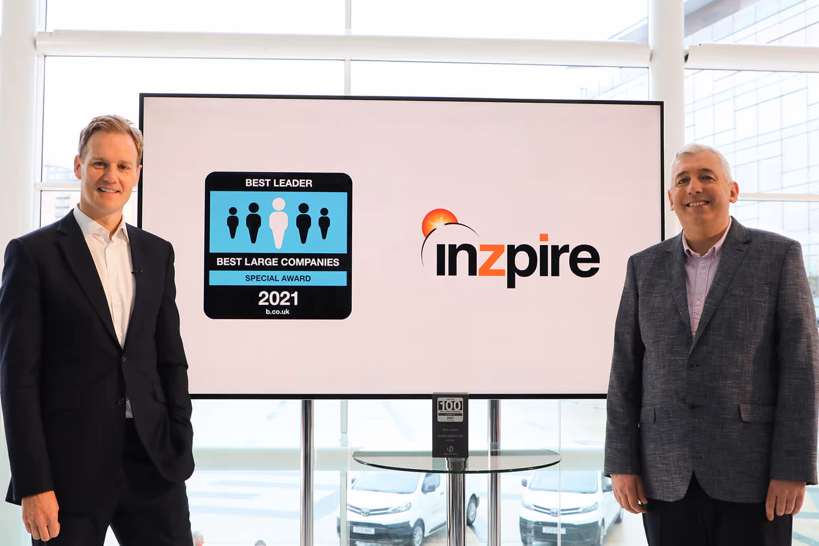 CEO of Inzpire Hugh Griffiths with Presenter Dank Walker and the Best Leader Special Award at Best Companies Live