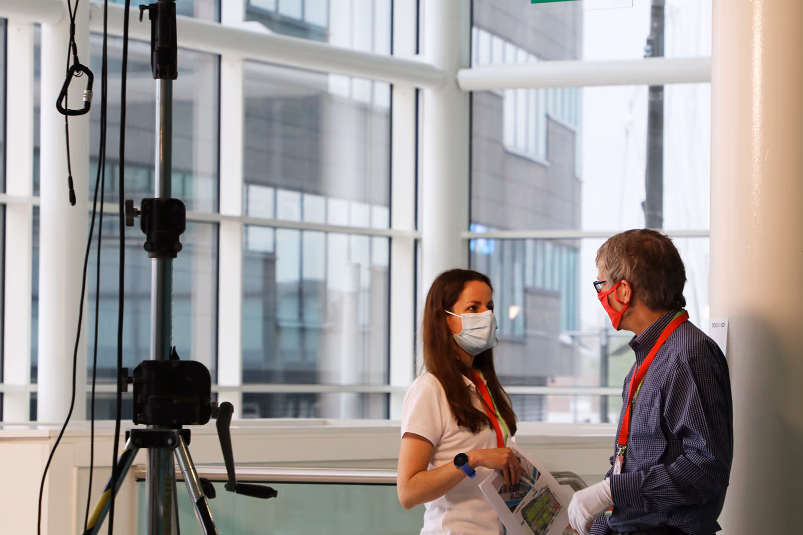 Two members of the Best Companies Live Event Team chatting behind the scenes