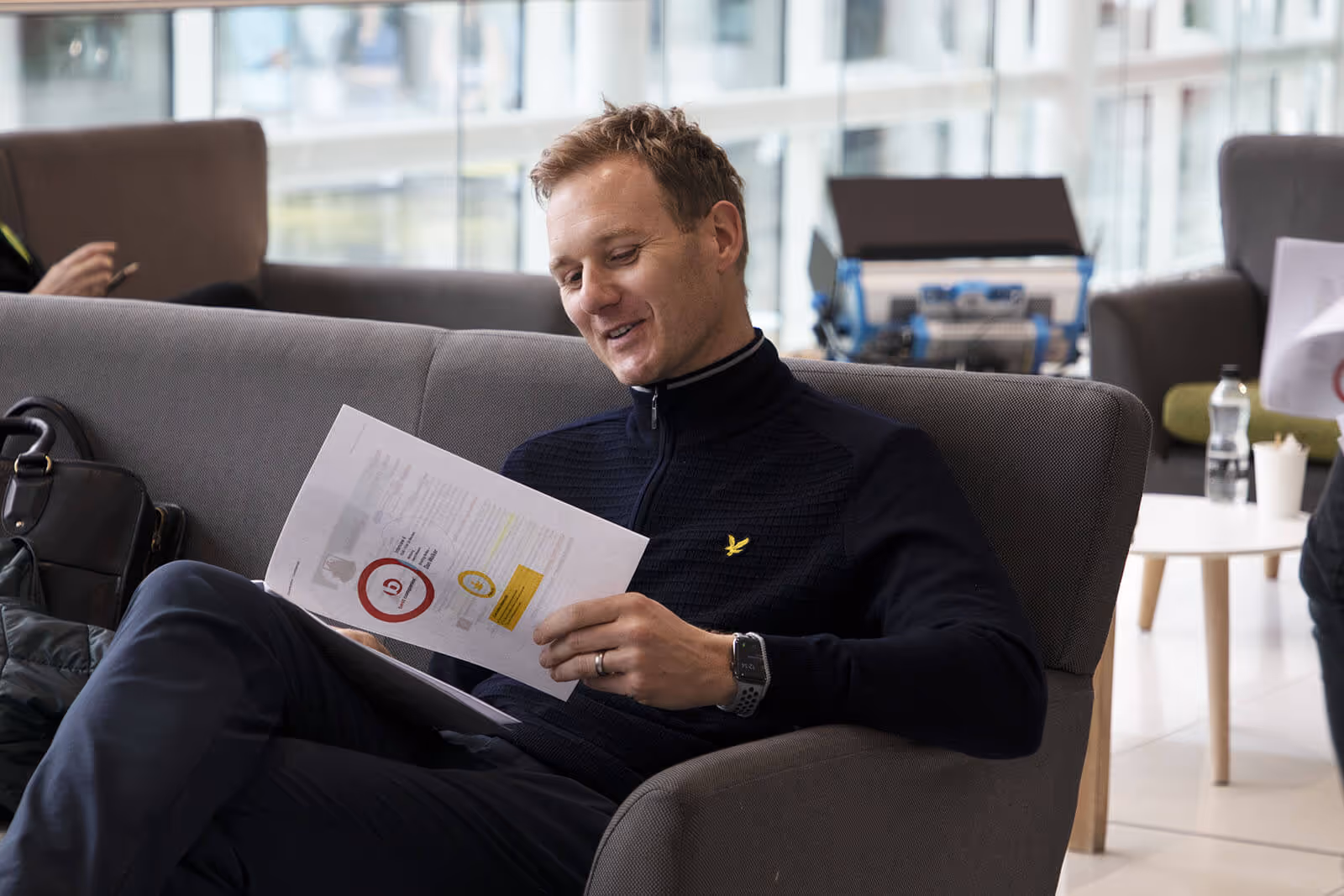 TV Presenter Dan Walker reading the script for Best Companies Live