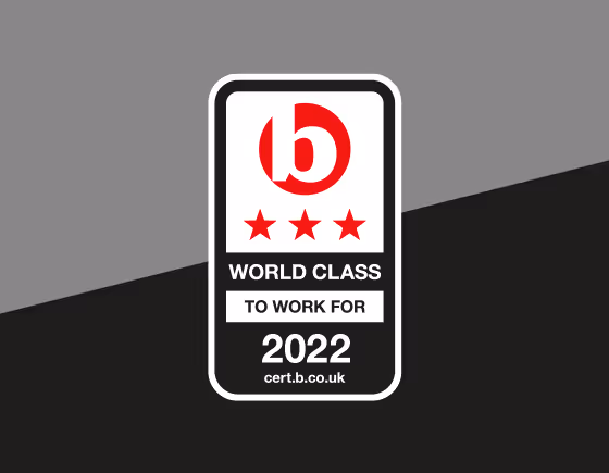 Accreditation logo used on grey and black