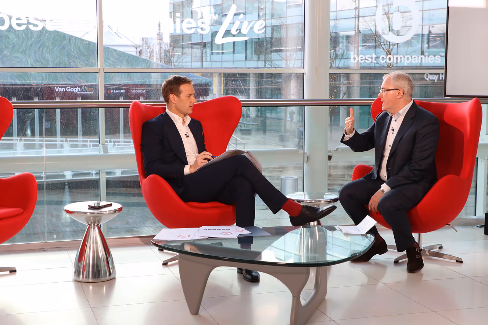 Presenter Dan Walker and Best Companies CEO Jonathan Austin onset during the welcome session at Best Companies Live