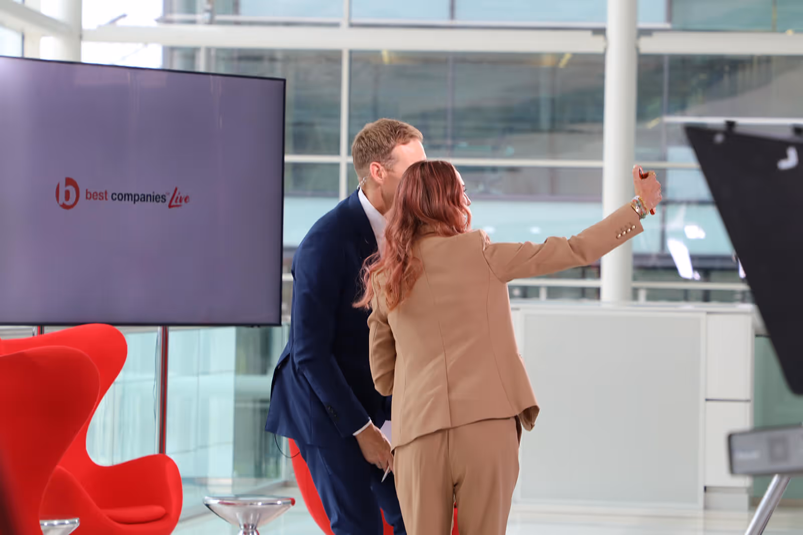 Born Social's Charlotte Hamill with Dan Walker, behind the scenes at Best Companies Live