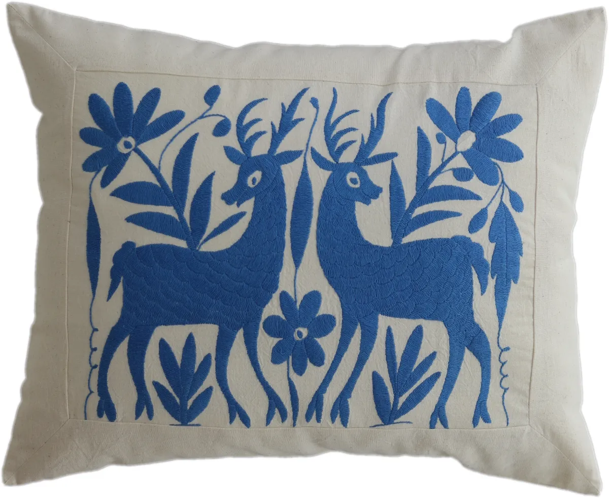 Rectangular, hand-embroidered cushion cover, made in Mexico.