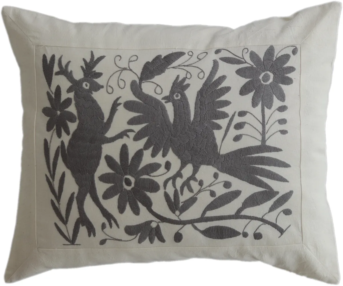 Rectangular, hand-embroidered cushion cover, made in Mexico.