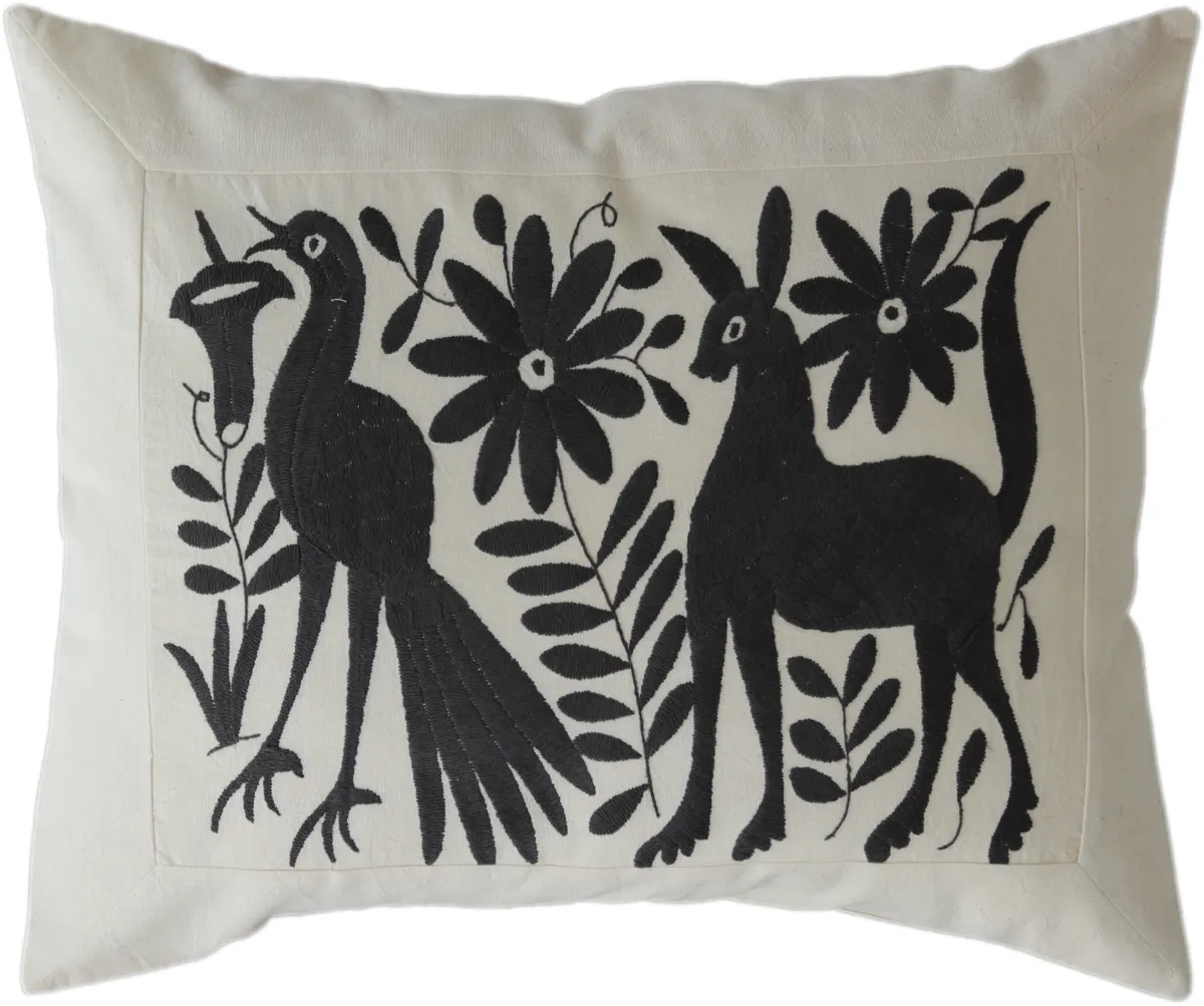 Rectangular, hand-embroidered cushion cover, made in Mexico.
