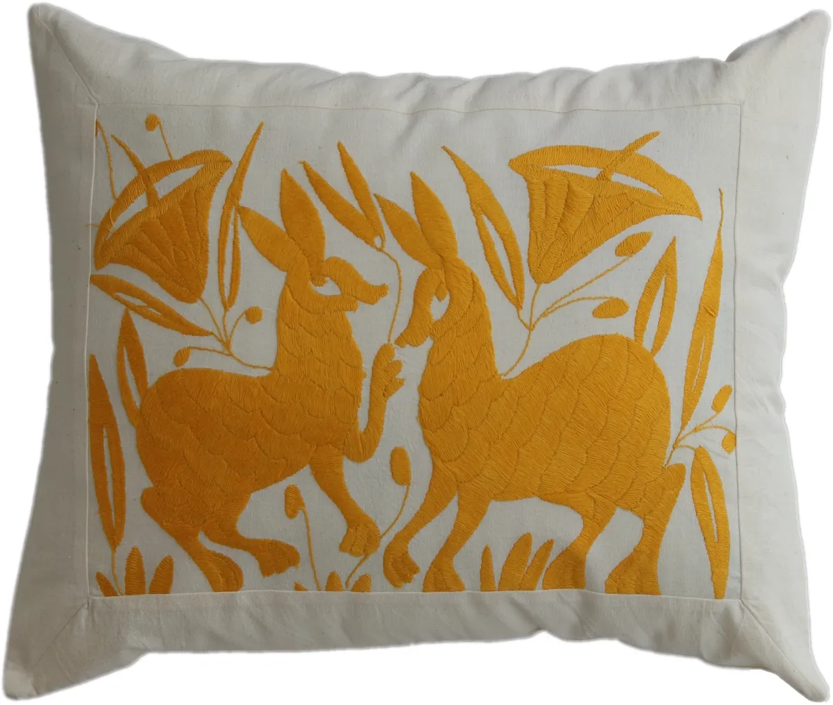 Hand-embroidered rectangular cushion cover, made in Mexico.