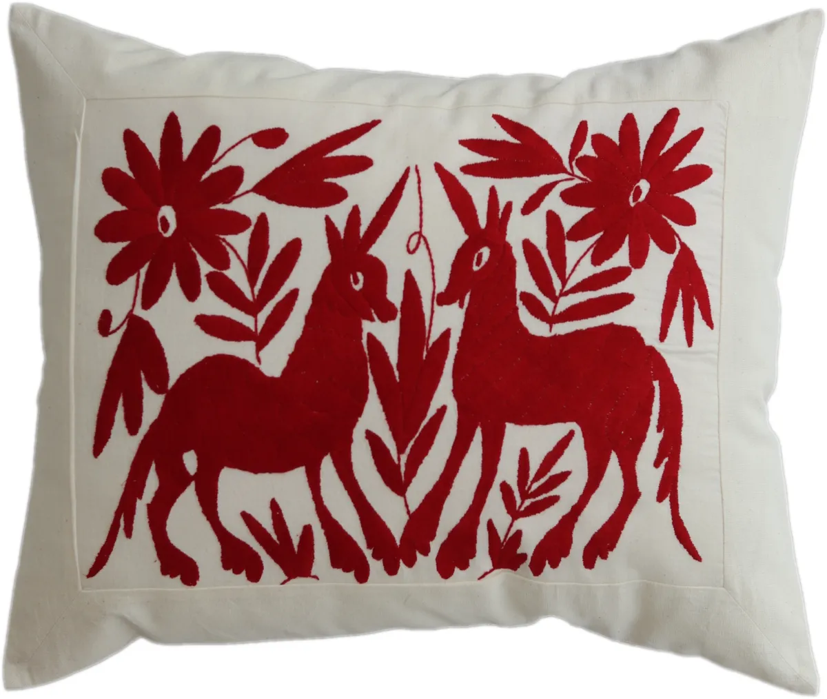 Hand-embroidered rectangular cushion cover, made in Mexico.