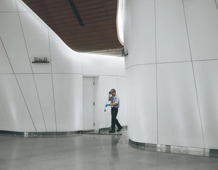 Commercial cleaner using a floor-scrubbing machine