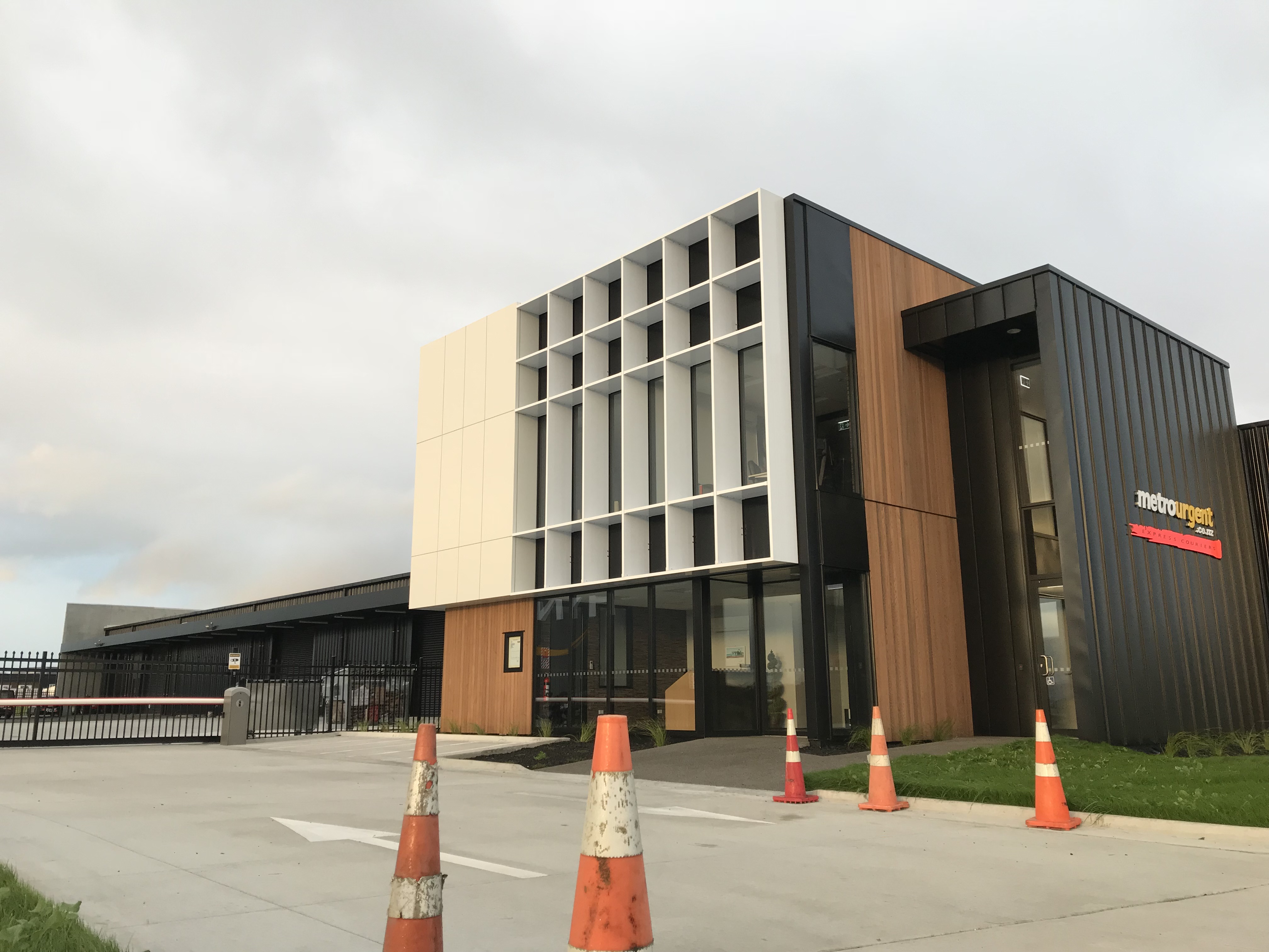 Professional exterior building washing in progress