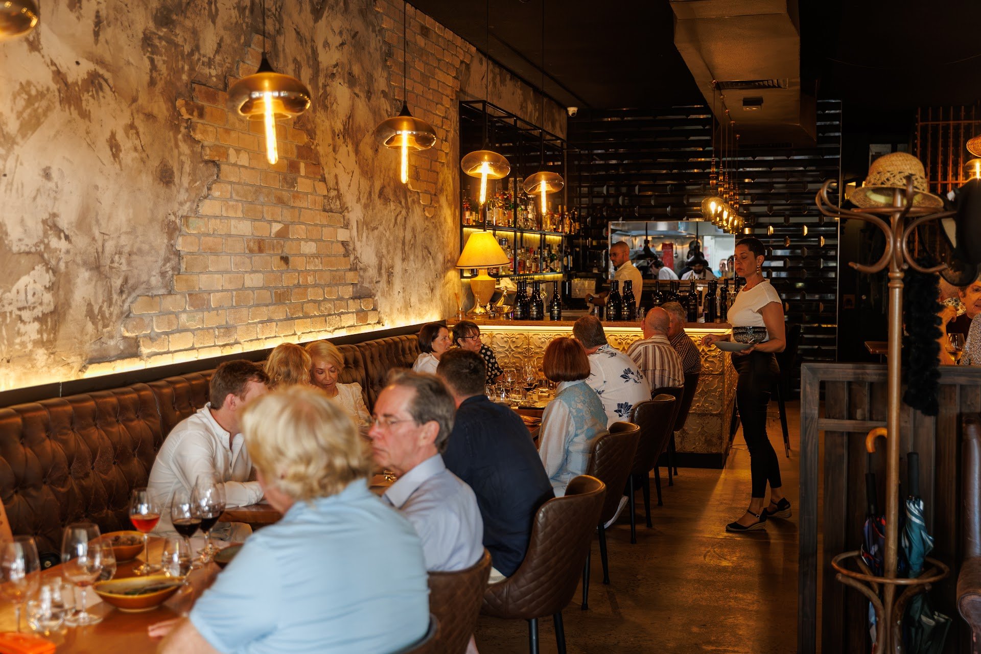 Guests dining together at Orléans Restaurant & Bar during a private long lunch function in Maroochydore