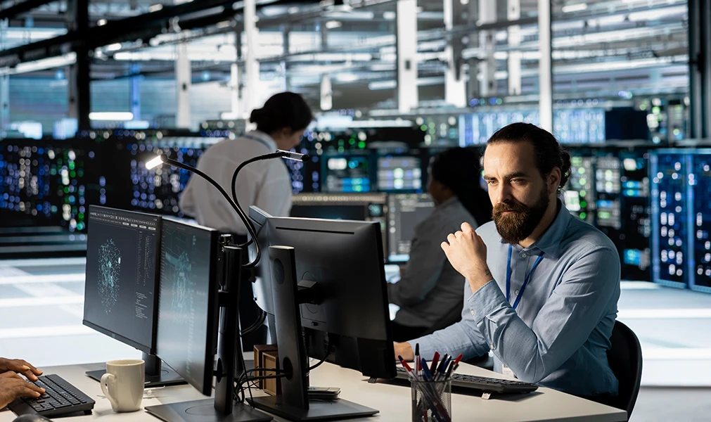 Network Engineer monitoring data center 24/7.