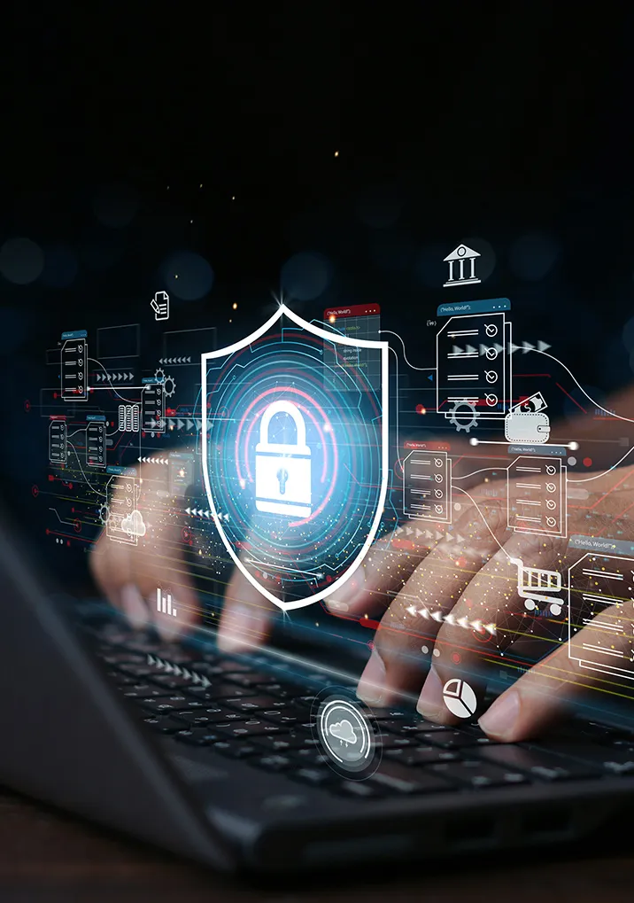 Hands typing on a laptop keyboard with a glowing security shield and digital data icons overlay.