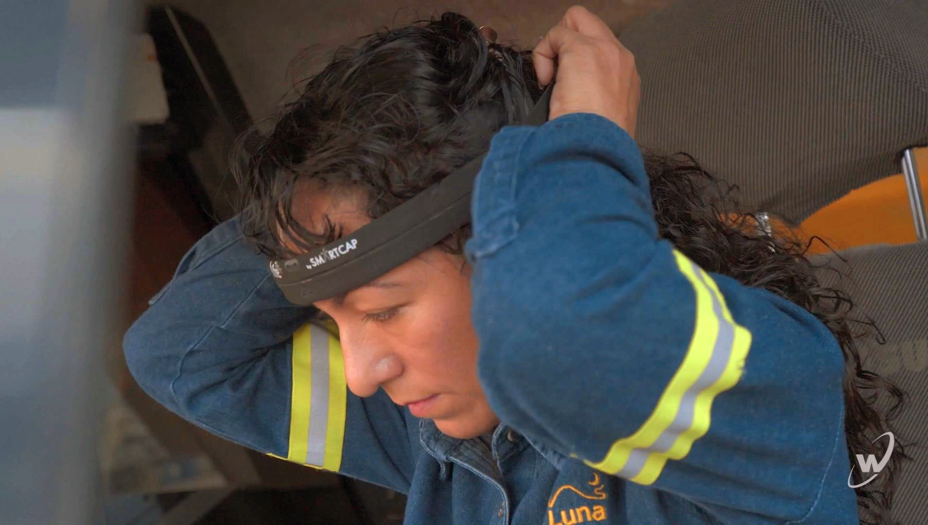 haul truck operator wearing SmartCap LifeBand fatigue monitor system