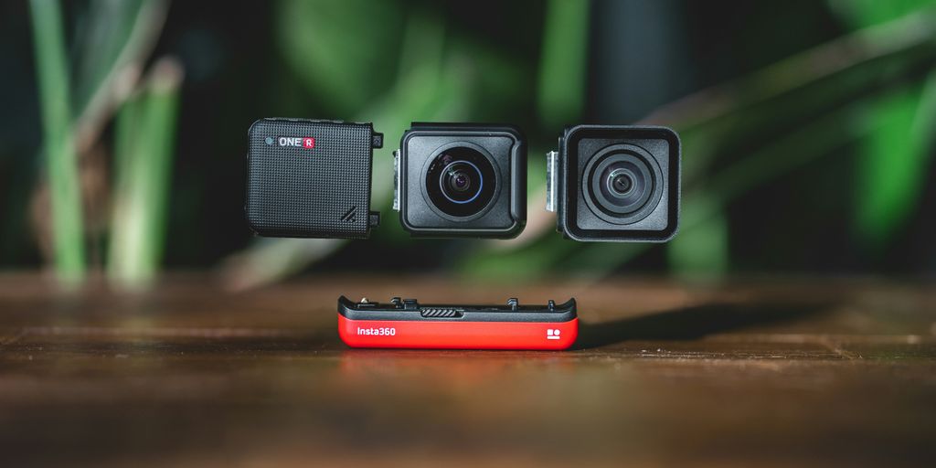 black and red speaker on brown wooden table