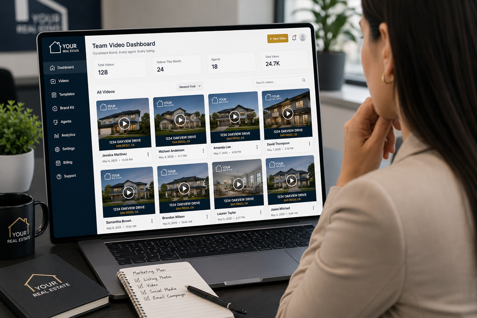 Team lead reviewing a real estate video creator dashboard used to manage branded videos across multiple agents