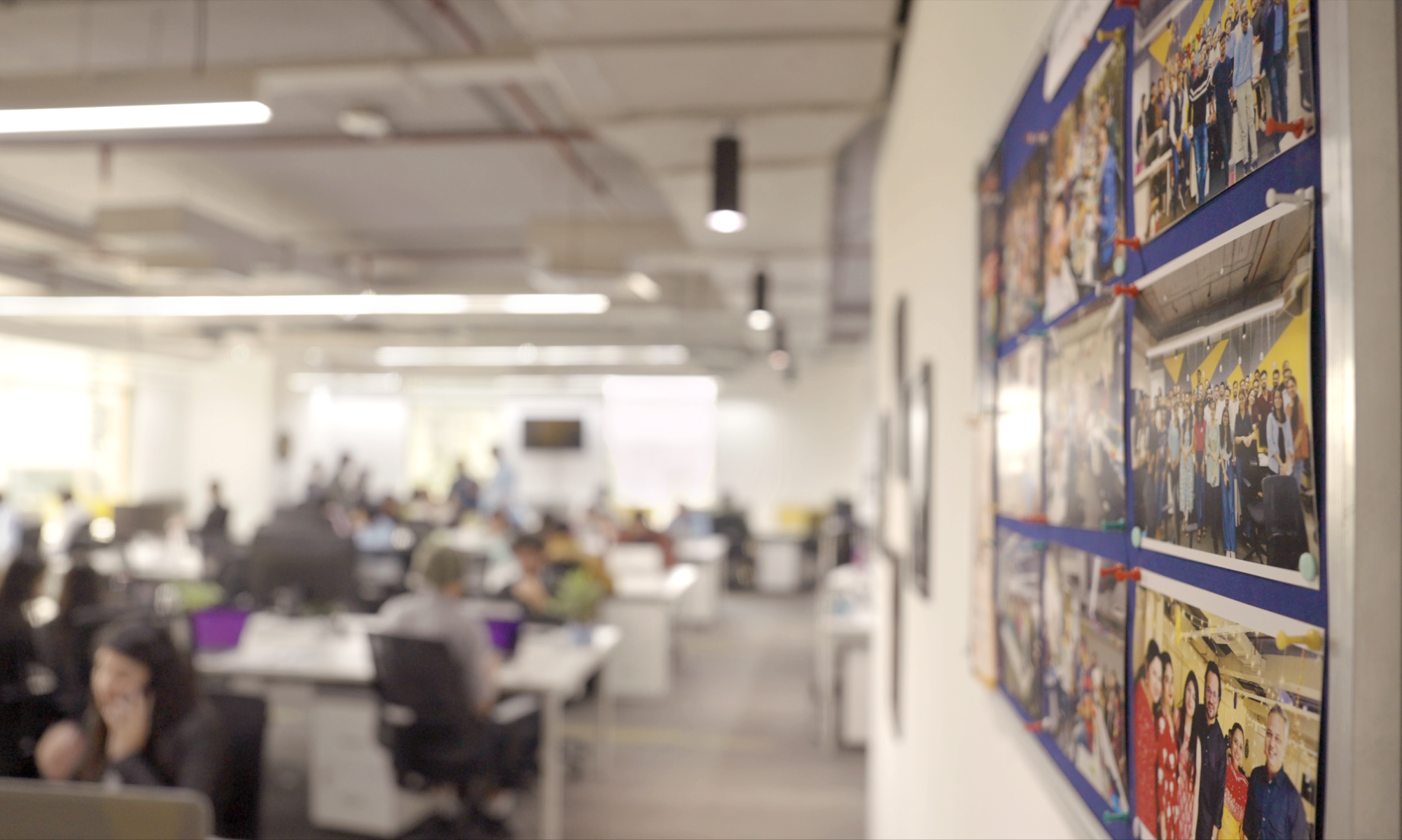 Studio Graphene team collaborating across global locations, designing AI-powered digital products that integrate strategy, design and engineering.