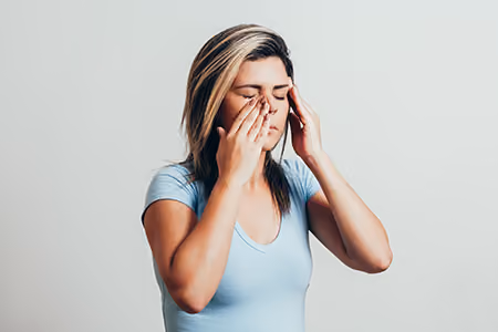 woman with sinus symptoms