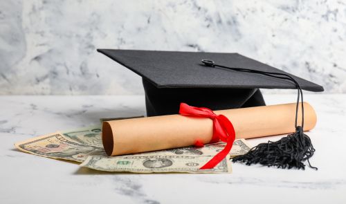 graduation cap and diploma