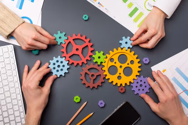 Free photo still life business roles with various mechanism pieces