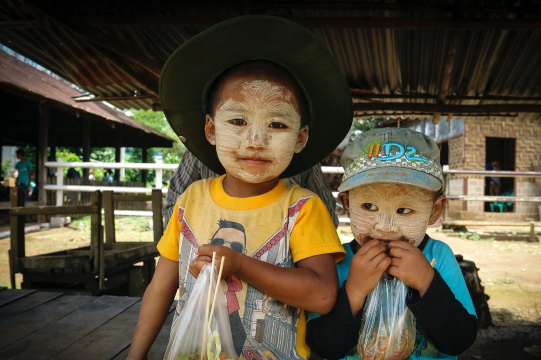 Two young boys with painted faces