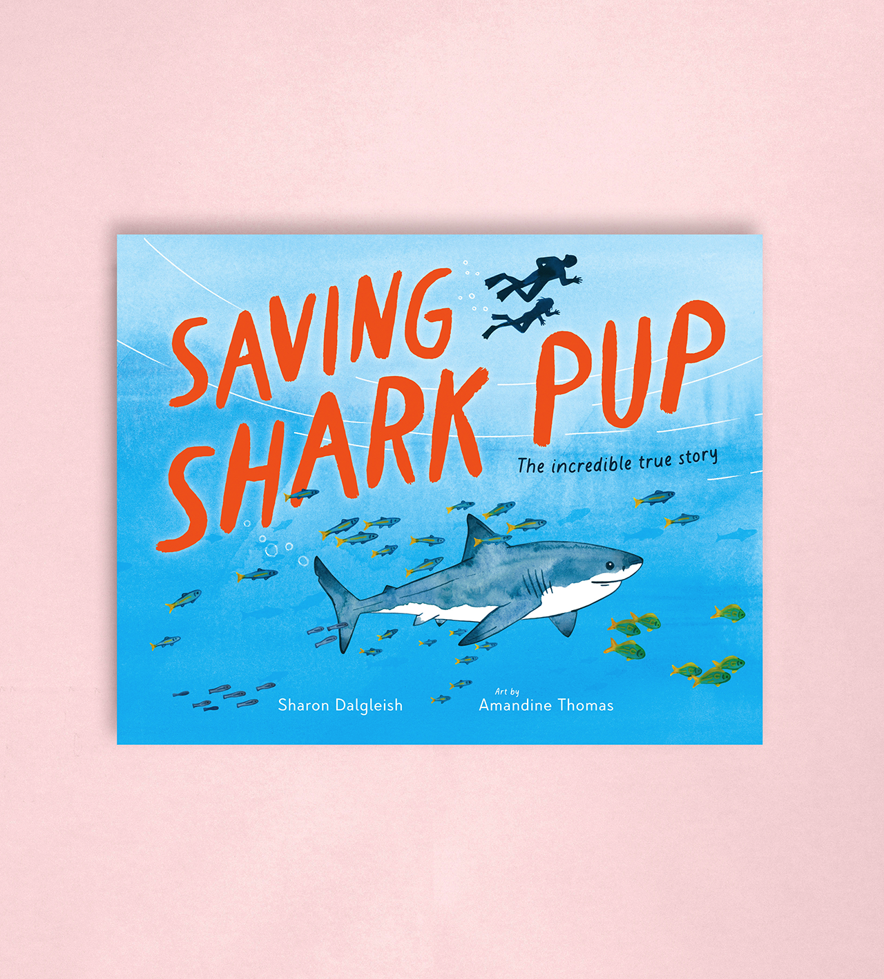 The cover of Saving Shark Pup, showing a great white shark swimming with divers.