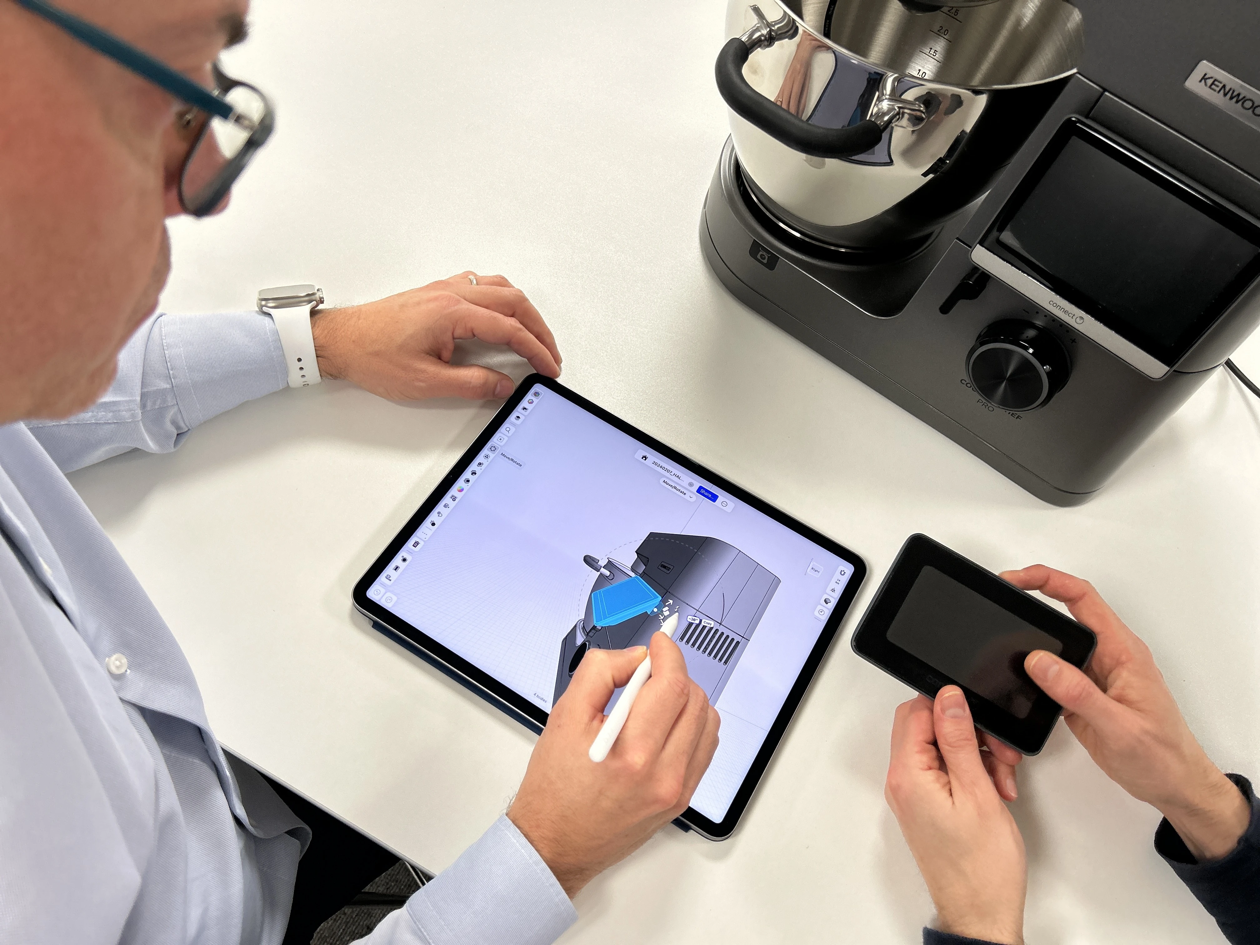A designer models an appliance part in 3D on the iPad using Shapr3D CAD software.