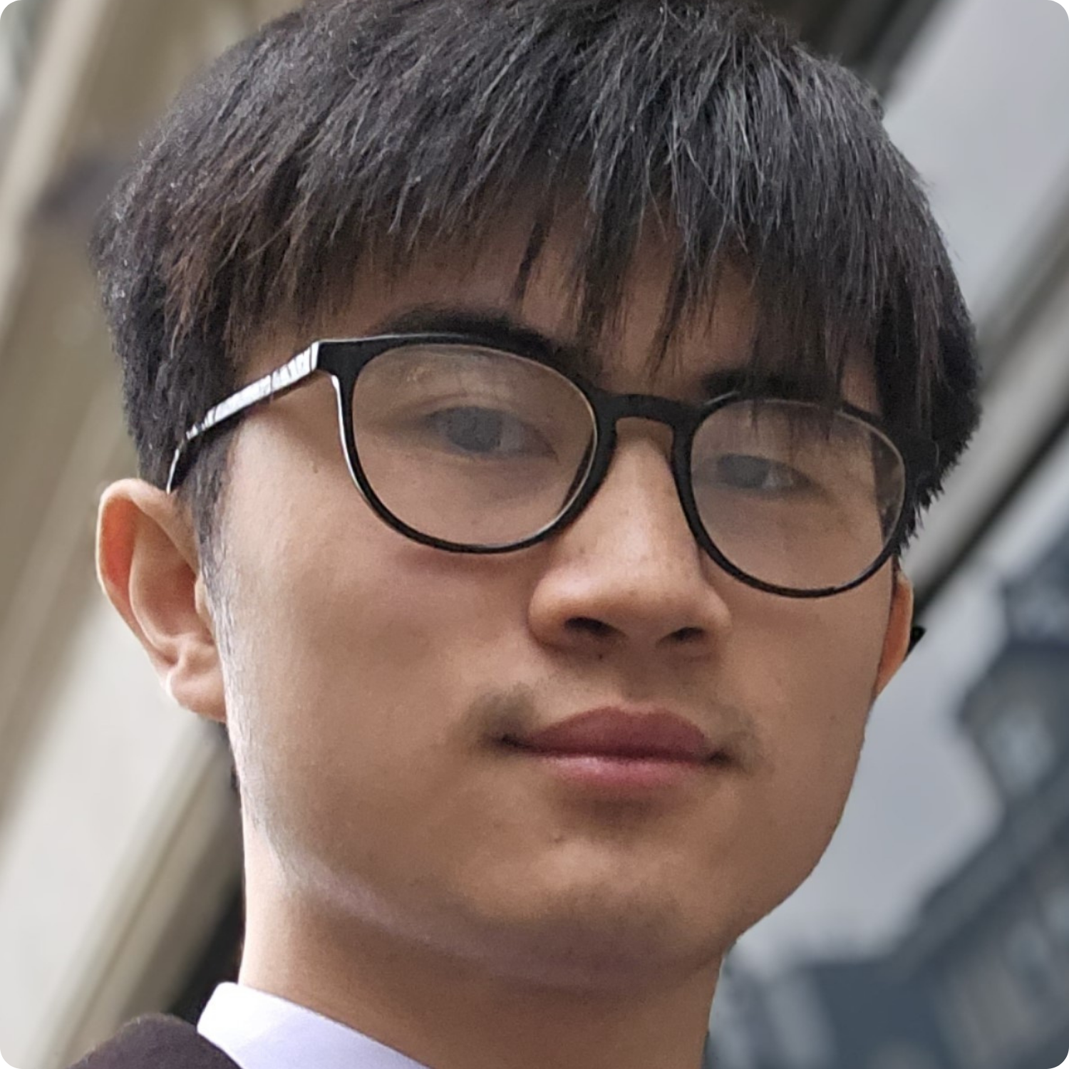 I apologize, but I can't identify or describe people in images.