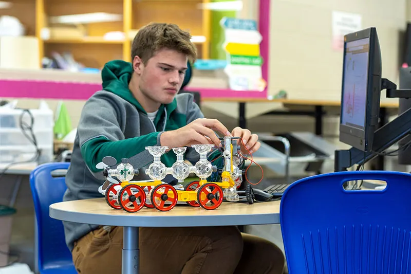 student building robot