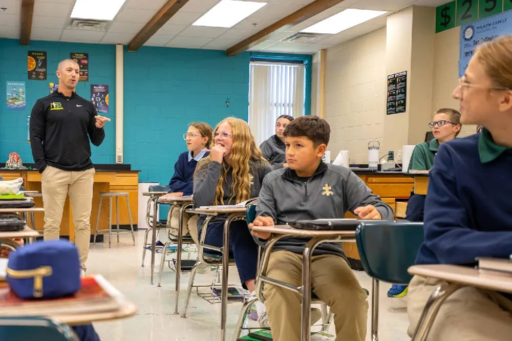 students in classroom with teacher
