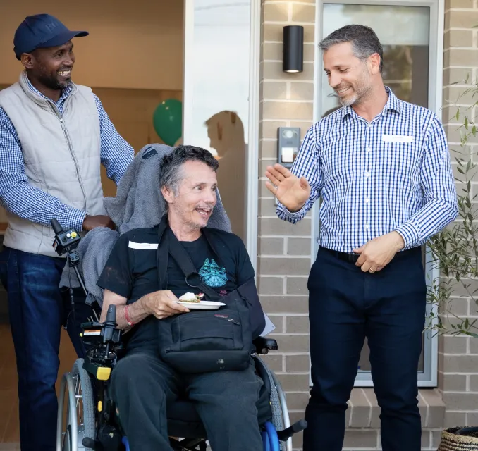 Person in wheelchair smiling